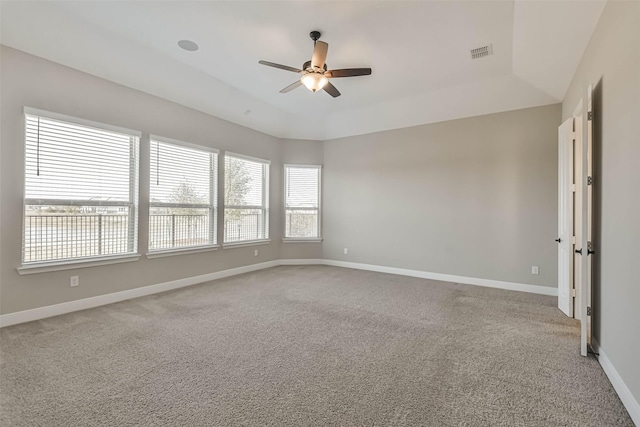 11131 Heartleaf Aster Way, Cypress, TX 77433 - spare room with light colored carpet, baseboards, a ceiling fan, and visible vents
