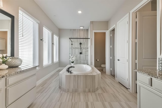 11131 Heartleaf Aster Way, Cypress, TX 77433 - full bath with toilet, a bath, walk in shower, vanity, and recessed lighting