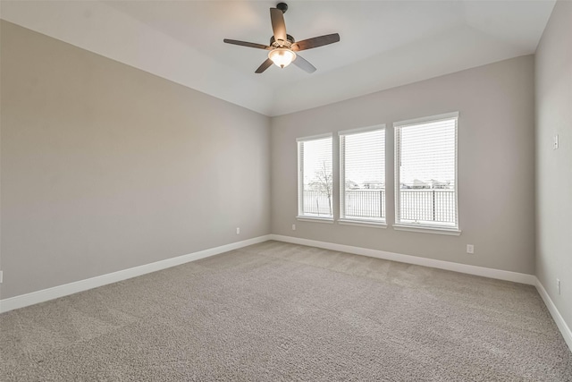 11131 Heartleaf Aster Way, Cypress, TX 77433 - spare room with light carpet, baseboards, and a ceiling fan