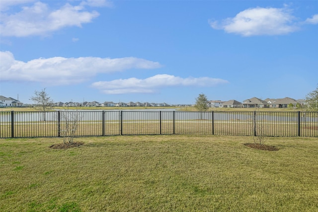 11131 Heartleaf Aster Way, Cypress, TX 77433 - view of yard with fence, a water view, and a residential view