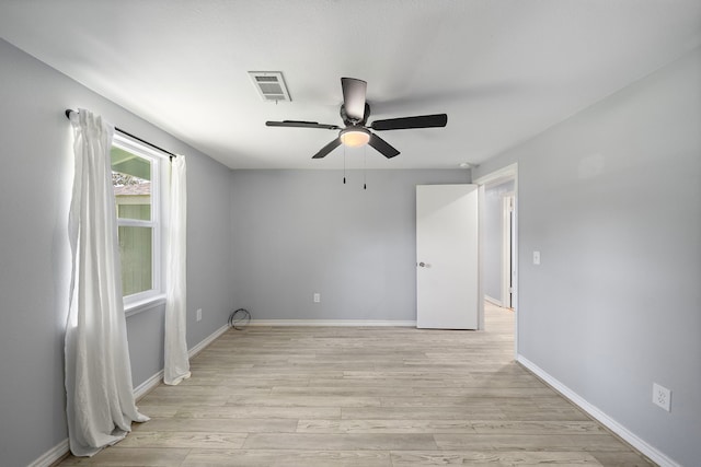 315 Lakeview Hbr, Onalaska, TX 77360 - empty room with ceiling fan, light wood-style flooring, and baseboards