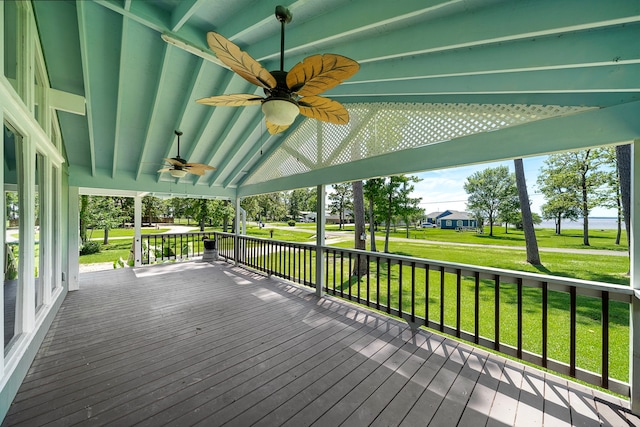 315 Lakeview Hbr, Onalaska, TX 77360 - deck featuring ceiling fan, a lawn, and covered porch