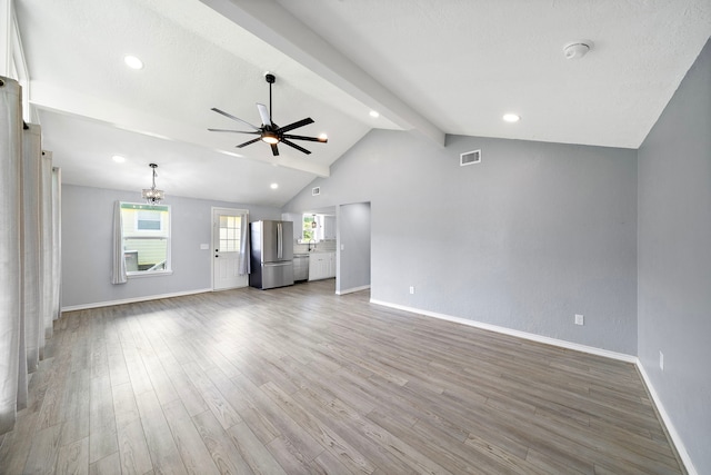 315 Lakeview Hbr, Onalaska, TX 77360 - unfurnished living room with a ceiling fan, baseboards, light wood finished floors, a chandelier, and recessed lighting
