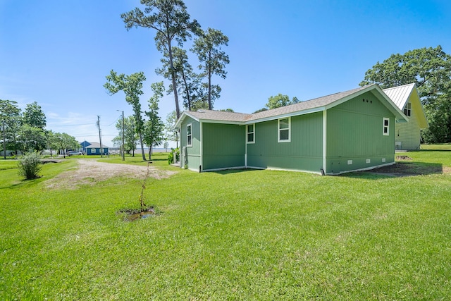 315 Lakeview Hbr, Onalaska, TX 77360 - back of property featuring a yard and crawl space
