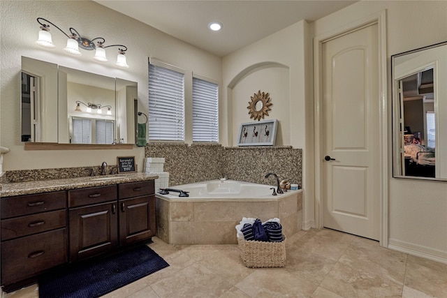 19089 Grandview Pt, Montgomery, TX 77356 - full bath featuring vanity, a garden tub, and tile patterned floors