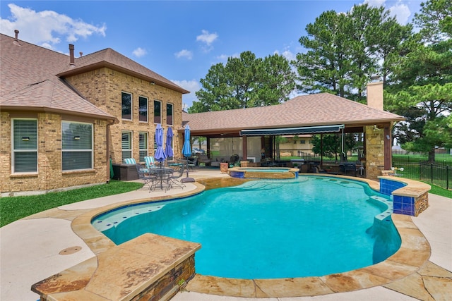 19089 Grandview Pt, Montgomery, TX 77356 - view of swimming pool featuring a patio area, fence, a gazebo, and a pool with connected hot tub