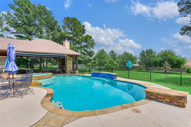 19089 Grandview Pt, Montgomery, TX 77356 - view of swimming pool with a patio area, a pool with connected hot tub, and a gazebo