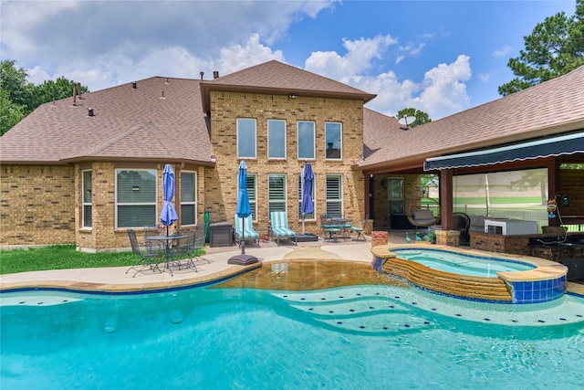 19089 Grandview Pt, Montgomery, TX 77356 - view of swimming pool featuring a patio and a pool with connected hot tub