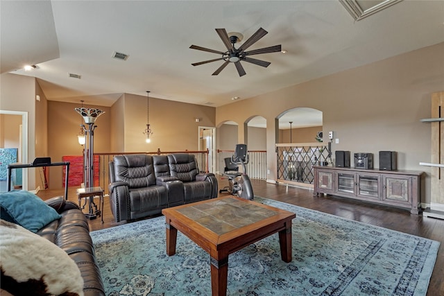 19089 Grandview Pt, Montgomery, TX 77356 - living room featuring a ceiling fan, wood finished floors, arched walkways, and baseboards