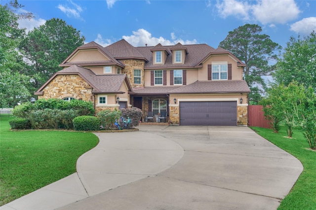 19089 Grandview Pt, Montgomery, TX 77356 - craftsman-style home featuring stone siding, stucco siding, driveway, an attached garage, and a shingled roof