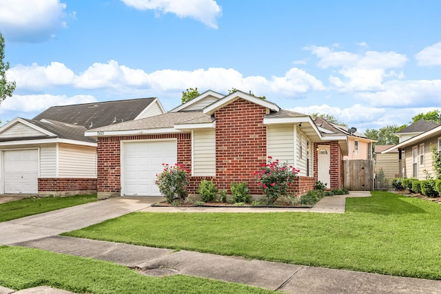 ranch-style home featuring driveway, brick siding, fence, an attached garage, and a front yard