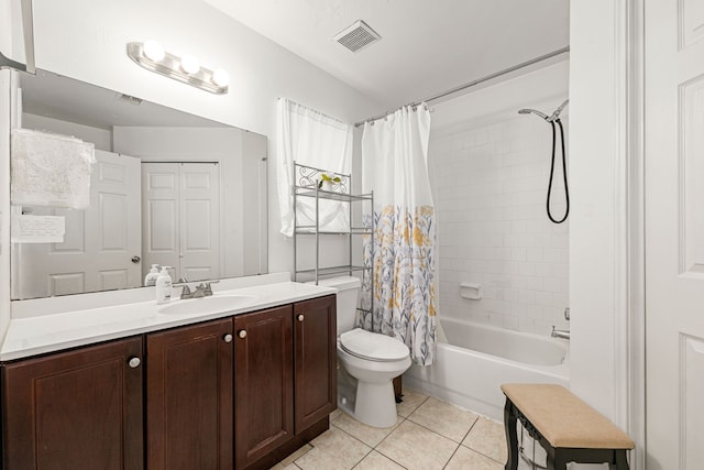 full bathroom featuring toilet, vanity, visible vents, tile patterned floors, and shower / tub combo