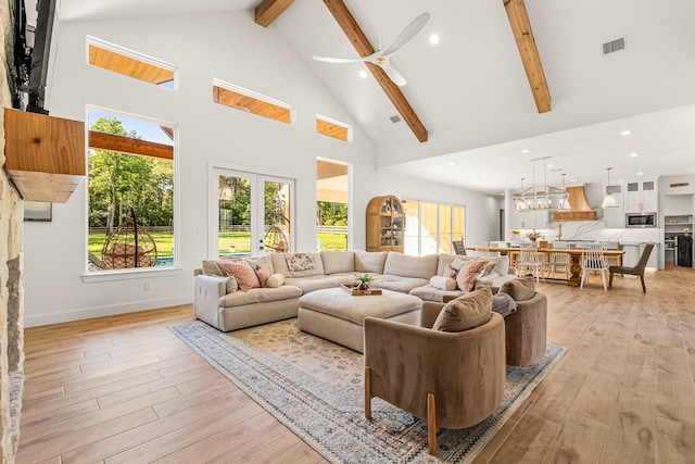 8577 Majestic Lake Ct, Montgomery, TX 77316 - living area with beamed ceiling, light wood-style flooring, high vaulted ceiling, baseboards, and recessed lighting