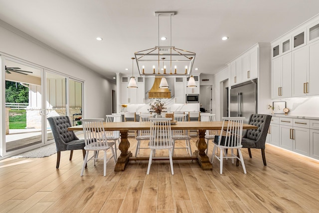 8577 Majestic Lake Ct, Montgomery, TX 77316 - dining space with recessed lighting, light wood-style flooring, ornamental molding, and a chandelier