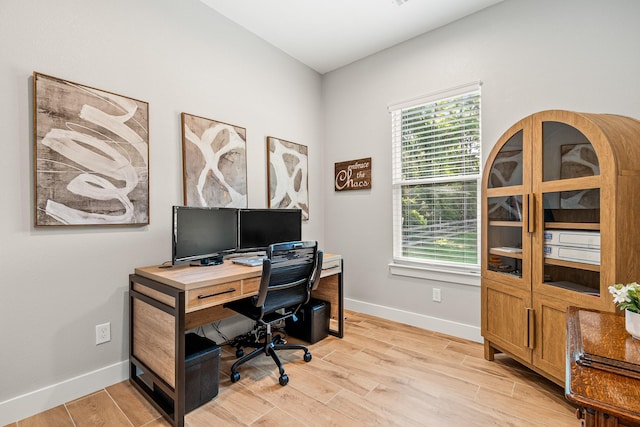 8577 Majestic Lake Ct, Montgomery, TX 77316 - office with baseboards and light wood-type flooring