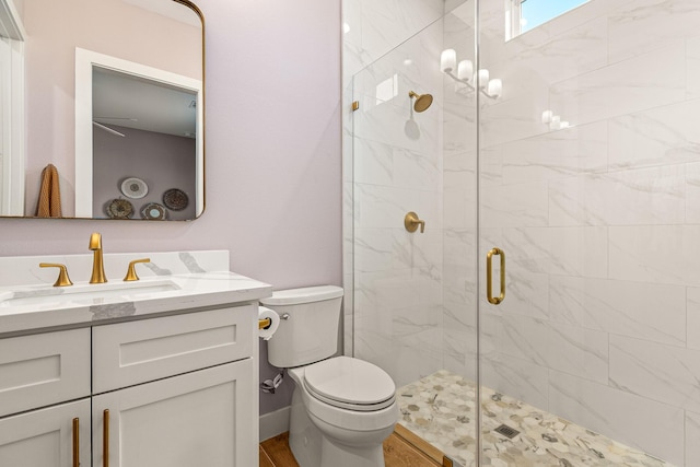 8577 Majestic Lake Ct, Montgomery, TX 77316 - full bathroom featuring a shower stall, toilet, and vanity