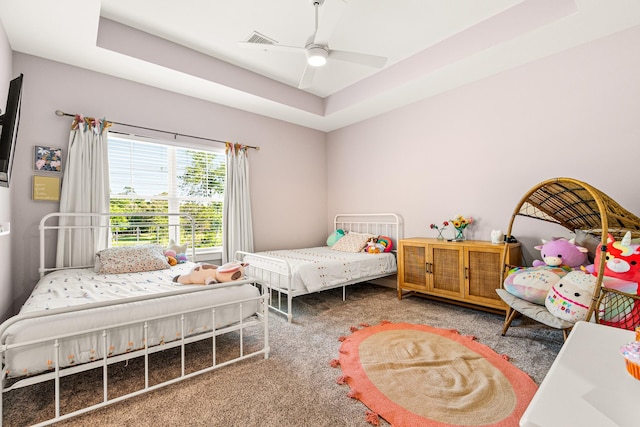8577 Majestic Lake Ct, Montgomery, TX 77316 - carpeted bedroom with ceiling fan and a raised ceiling