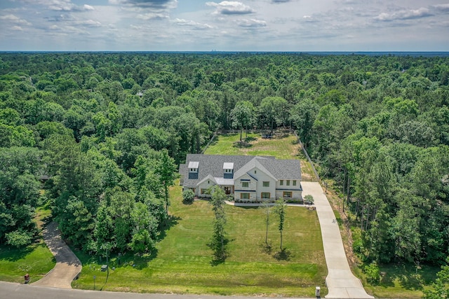 8577 Majestic Lake Ct, Montgomery, TX 77316 - view from above of property featuring a heavily wooded area