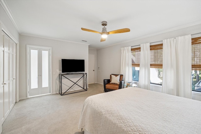 167 Litchfield Ln, Houston, TX 77024 - bedroom featuring a ceiling fan, visible vents, crown molding, and carpet floors