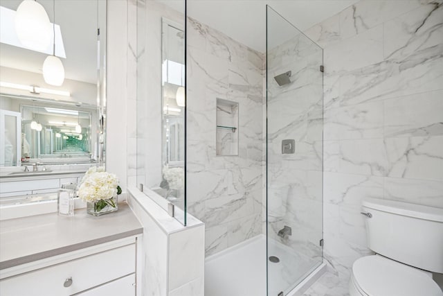 167 Litchfield Ln, Houston, TX 77024 - full bathroom featuring vanity, toilet, a marble finish shower, and marble finish floor