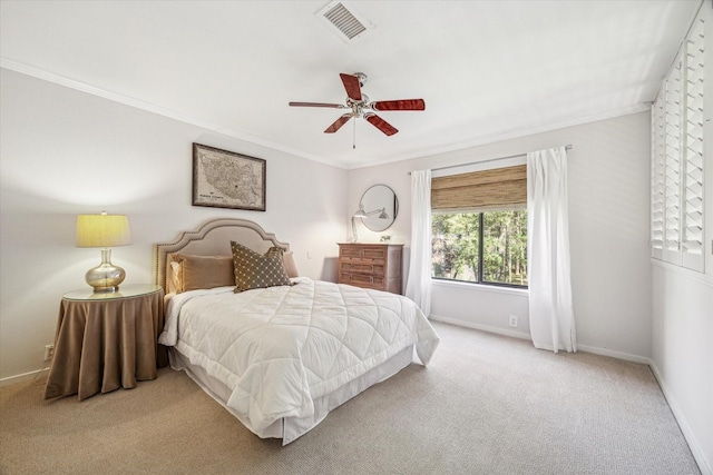 167 Litchfield Ln, Houston, TX 77024 - bedroom featuring carpet, baseboards, ceiling fan, visible vents, and crown molding