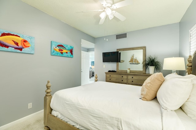 1401 E Beach Dr Unit 811, Galveston, TX 77550 - bedroom featuring baseboards, a ceiling fan, visible vents, and carpet floors