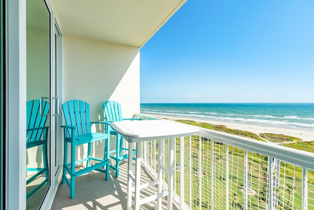 1401 E Beach Dr Unit 811, Galveston, TX 77550 - balcony with a water view and a beach view