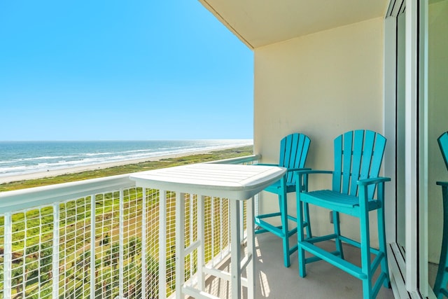 1401 E Beach Dr Unit 811, Galveston, TX 77550 - balcony with a water view and a beach view