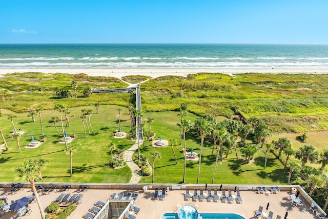 1401 E Beach Dr Unit 811, Galveston, TX 77550 - drone / aerial view featuring a water view and a beach view