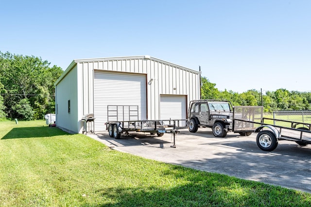 view of outbuilding featuring an outdoor structure and fence