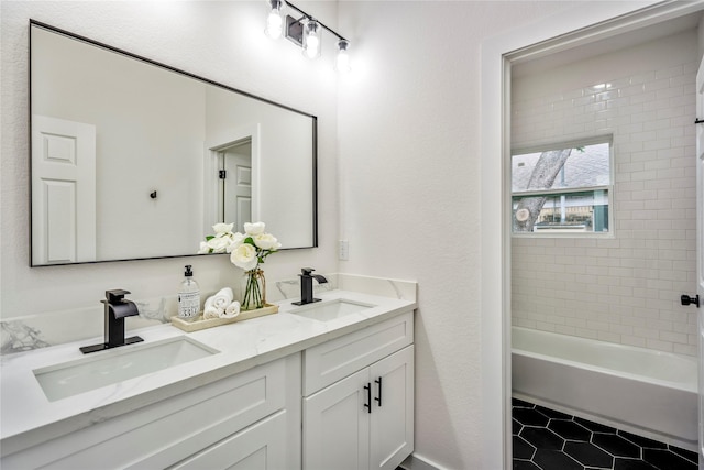 4104 Engelke St, Houston, TX 77003 - full bathroom featuring a sink, double vanity, and tile patterned flooring