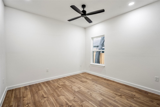 4104 Engelke St, Houston, TX 77003 - spare room with baseboards, ceiling fan, recessed lighting, and wood finished floors