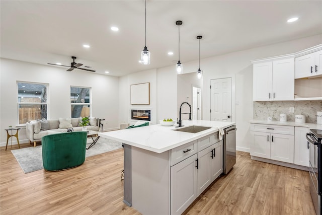 4104 Engelke St, Houston, TX 77003 - kitchen with recessed lighting, dishwasher, a ceiling fan, and a sink