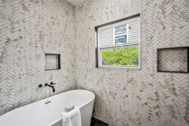 4104 Engelke St, Houston, TX 77003 - full bathroom featuring a freestanding tub