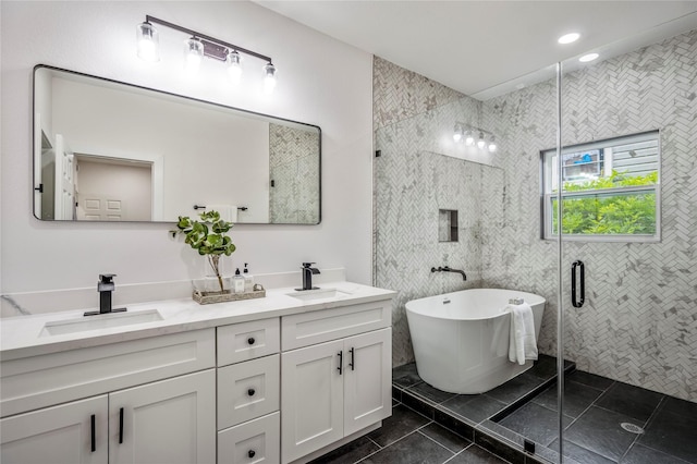 4104 Engelke St, Houston, TX 77003 - bathroom with double vanity, a freestanding bath, a stall shower, and a sink