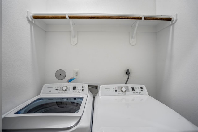 4104 Engelke St, Houston, TX 77003 - washroom with laundry area and separate washer and dryer