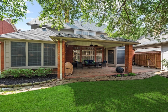 7219 Palisades Heights Dr, Houston, TX 77095 - rear view of house featuring ceiling fan, brick siding, a patio area, outdoor lounge area, and a gate