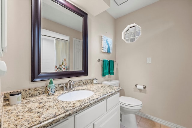 7219 Palisades Heights Dr, Houston, TX 77095 - bathroom featuring toilet, tile patterned flooring, vanity, and baseboards