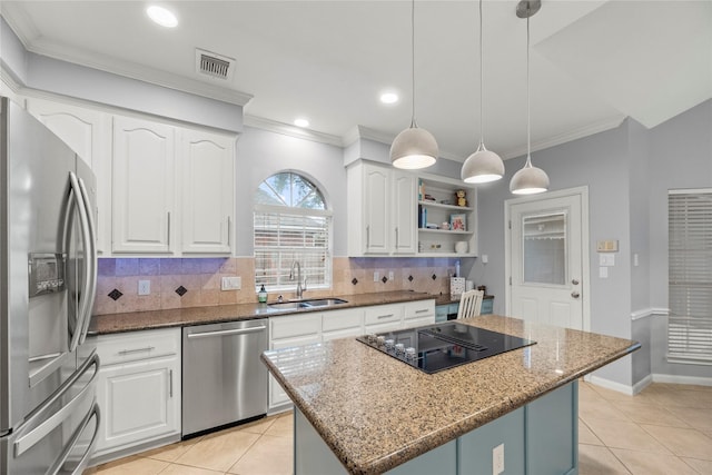 7219 Palisades Heights Dr, Houston, TX 77095 - kitchen with stainless steel appliances, a sink, crown molding, dark stone counters, and a kitchen island