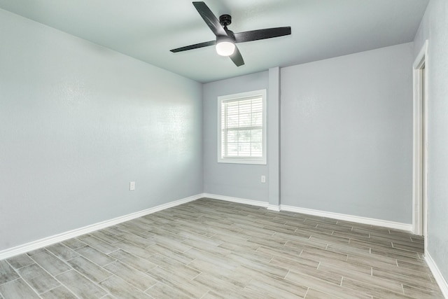 unfurnished bedroom featuring baseboards, ceiling fan, and light wood-type flooring