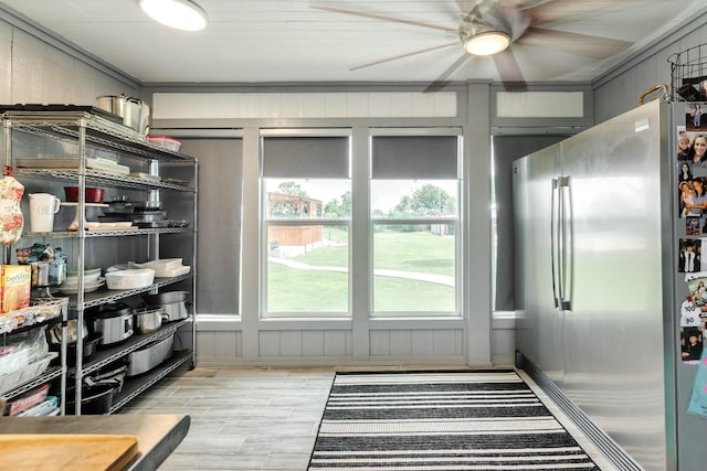 interior space with a ceiling fan