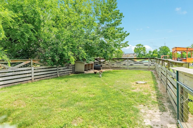 view of yard featuring a fenced backyard