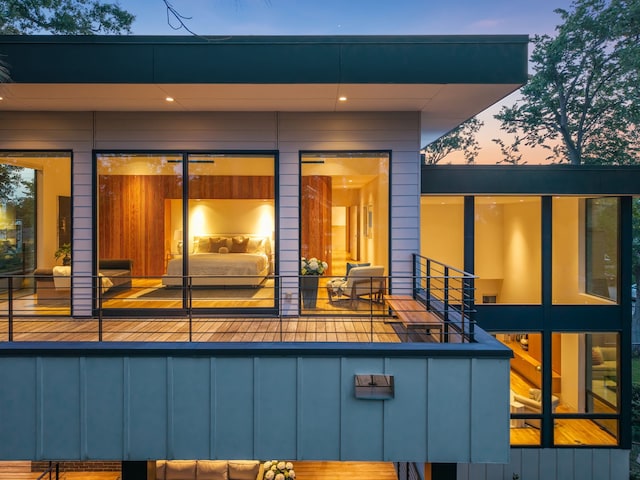 1900 W 14th St, Houston, TX 77008 - rear view of house featuring board and batten siding