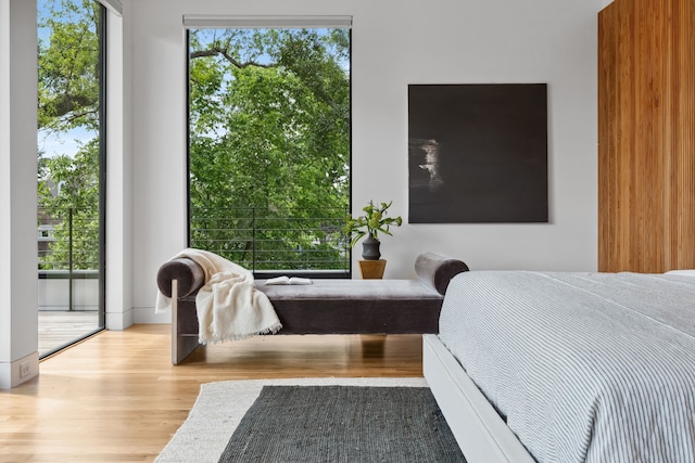 1900 W 14th St, Houston, TX 77008 - bedroom featuring access to outside and wood finished floors