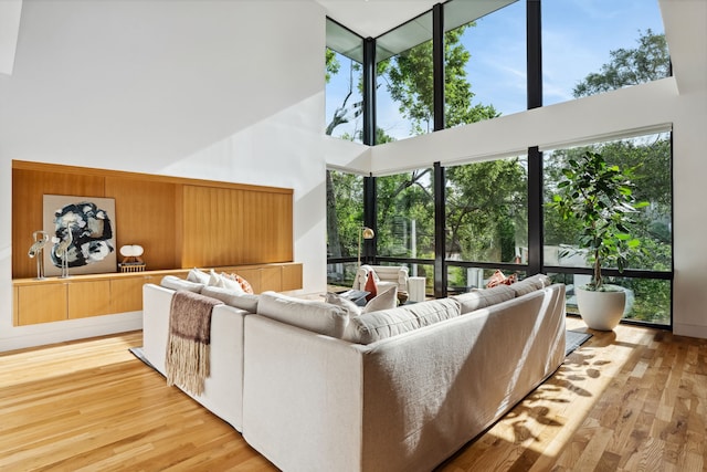 1900 W 14th St, Houston, TX 77008 - living area with wood finished floors and a high ceiling