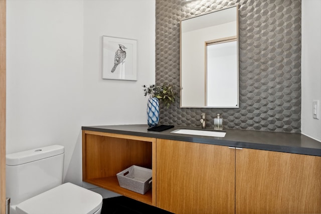 1900 W 14th St, Houston, TX 77008 - half bath with toilet, vanity, and tasteful backsplash
