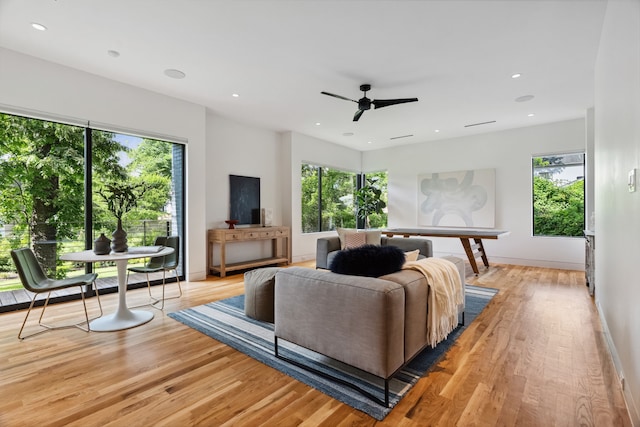 1900 W 14th St, Houston, TX 77008 - living area featuring light wood-style flooring, baseboards, ceiling fan, and recessed lighting