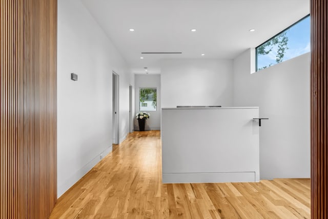 1900 W 14th St, Houston, TX 77008 - corridor featuring light wood-style flooring, an upstairs landing, and recessed lighting