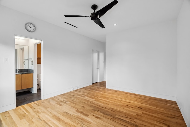 1900 W 14th St, Houston, TX 77008 - interior space featuring recessed lighting, ensuite bath, visible vents, a sink, and wood finished floors