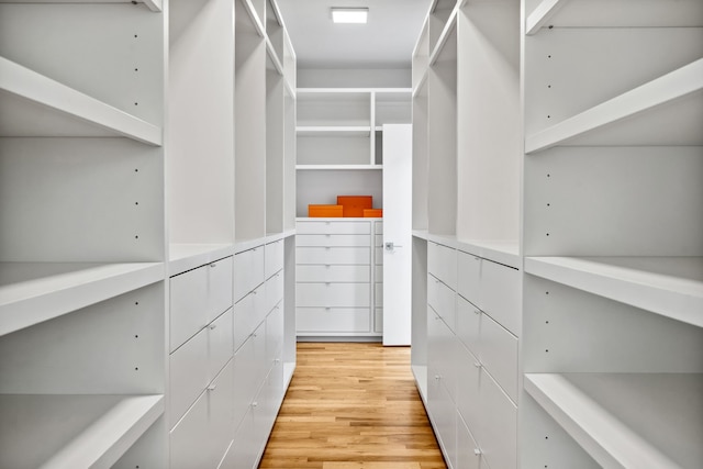 1900 W 14th St, Houston, TX 77008 - walk in closet with light wood-style flooring